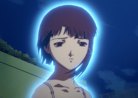 Lain staring into the distance with a blue glow around her